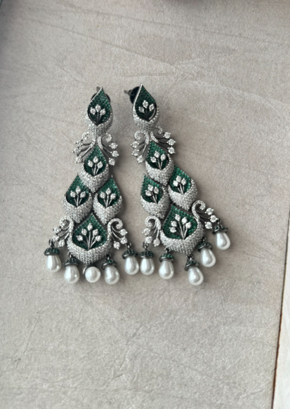 Emerald on cubic zirconia